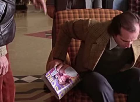 Jack holding the infamous magazine in a shot from the film.