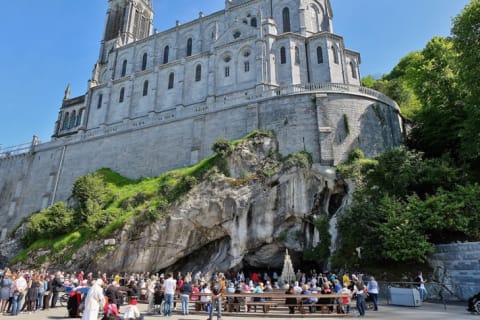 Pilgrims visiting the Sanctuary of Our Lady of Lourdes in Lourdes, France.