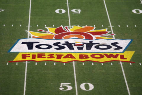 Lots of chip-sharing happens during the Fiesta Bowl.