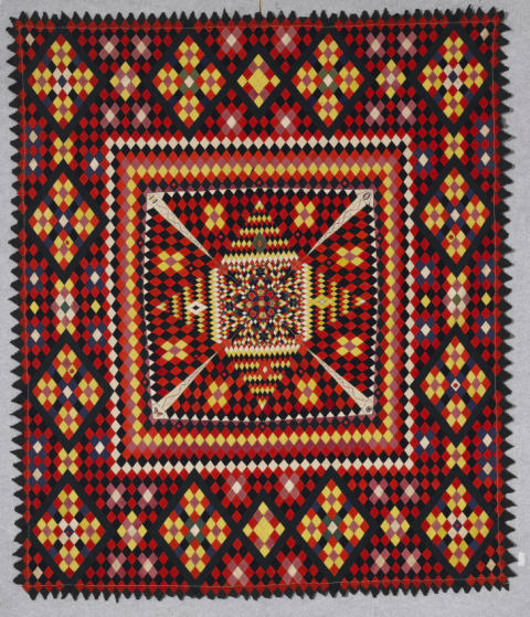 Anglo-Zulu War Army Quilt, Artist unidentified, South Africa or United Kingdom, Late 19th century, Wool from military uniforms, with embroidery thread; hand-embroidered, with pointed and pinked edges, 86 5/8 inches by 74 7/8 inches